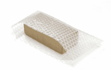 Cushion bubble plastic over a corrugated box