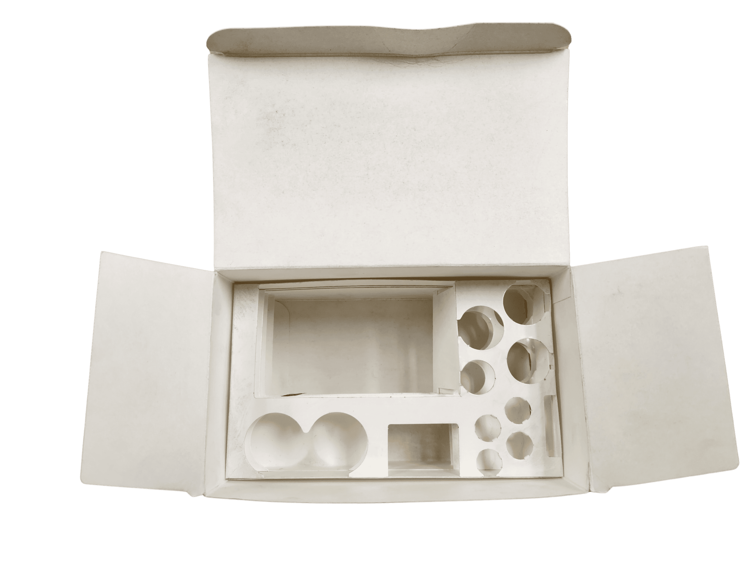 Custom folding carton auto bottom with chipboard insert and cavities