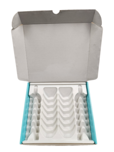 Corrugated box with thermoform insert cavities