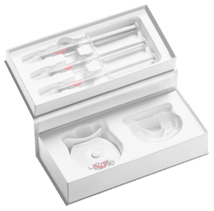 Rigid box with thermoform insert and custom cavities